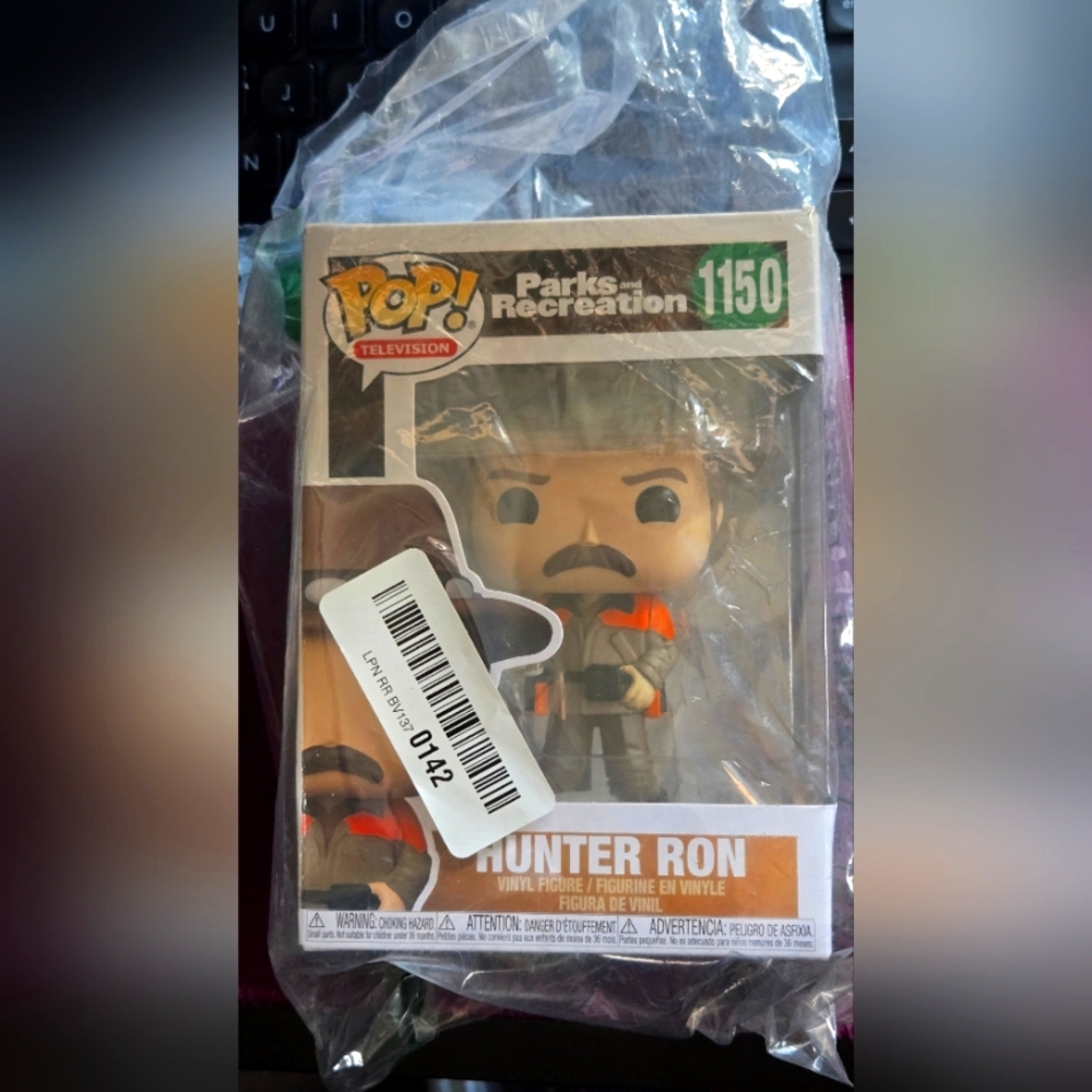 Funko Pop Figure with Black and Orange Details